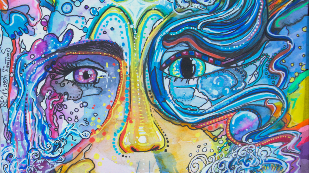 Colorful abstract artwork of a face with intricate designs and vibrant colors.
